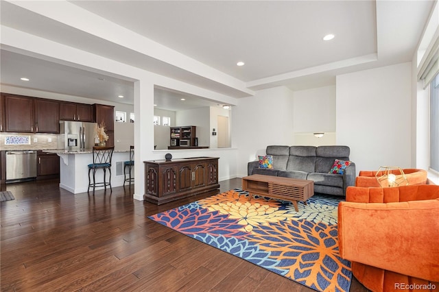 living room with dark wood-type flooring