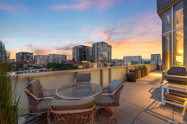 55 W 12th Ave Unit 608, Denver, CO 80204 - balcony with a city view, outdoor dining area, and grilling area