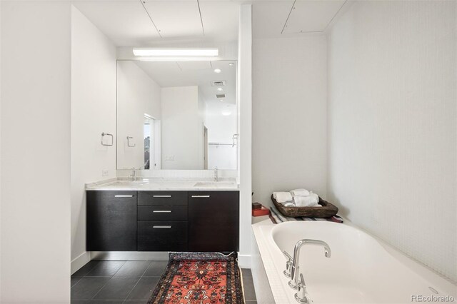 55 W 12th Ave Unit 608, Denver, CO 80204 - bathroom with a garden tub, double vanity, and tile patterned floors