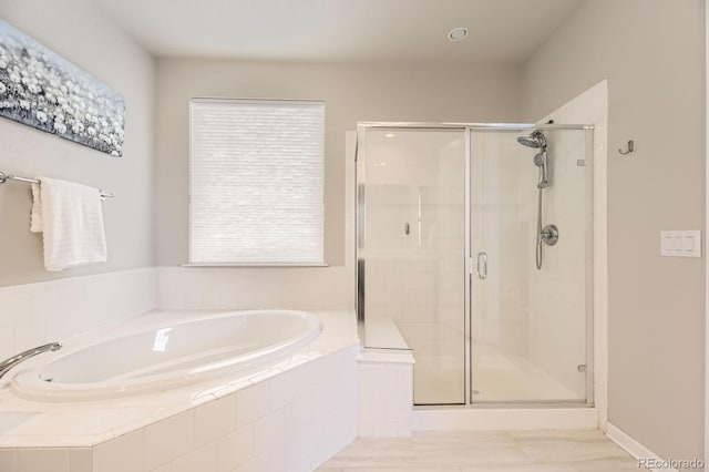 21855 E Idyllwilde Dr, Parker, CO 80138 - bathroom featuring a bath and a shower stall