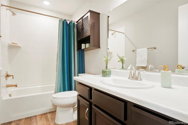 6041 N Orleans St, Aurora, CO 80019 - bathroom with shower / bath combination with curtain, vanity, and wood finished floors