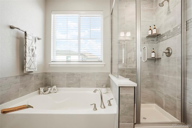 6041 N Orleans St, Aurora, CO 80019 - bathroom featuring a garden tub and a shower stall