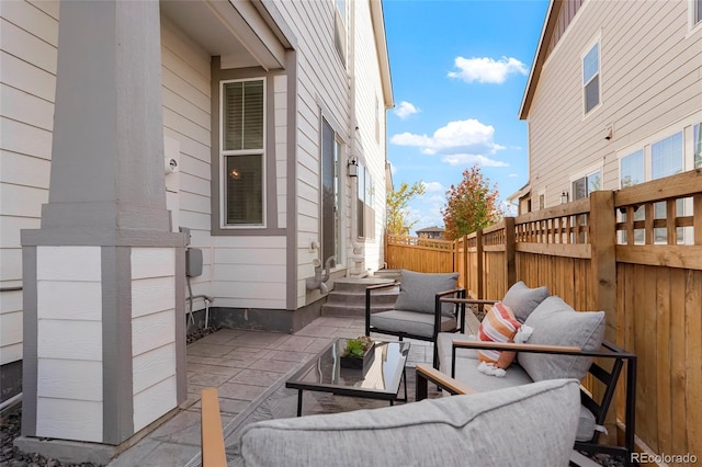 6041 N Orleans St, Aurora, CO 80019 - view of patio featuring outdoor lounge area