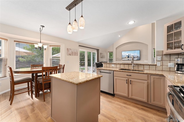 1825 Cooper Ct, Castle Rock, CO 80109 - kitchen with dishwasher, a chandelier, a sink, light wood-style floors, and glass insert cabinets