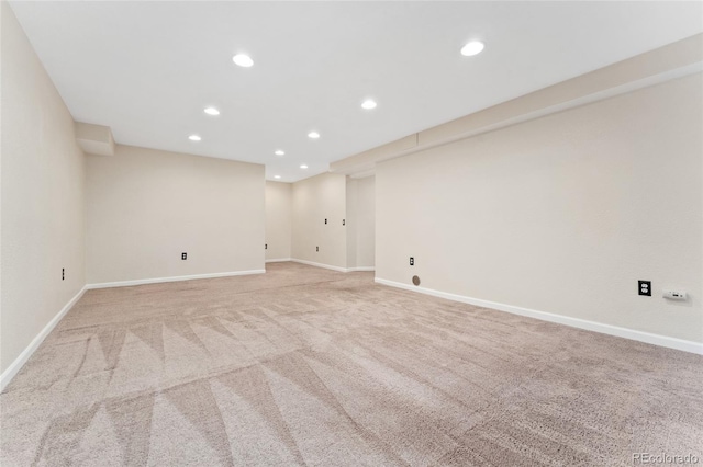 1825 Cooper Ct, Castle Rock, CO 80109 - finished below grade area with recessed lighting, light carpet, and baseboards