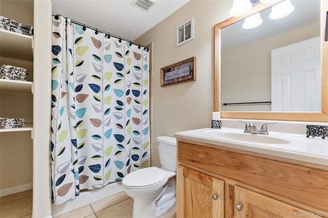 1825 Cooper Ct, Castle Rock, CO 80109 - bathroom featuring toilet, tile patterned floors, and vanity