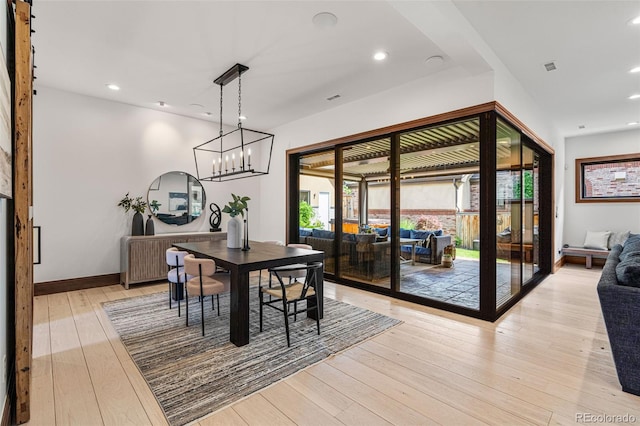 dining area with light wood-type flooring