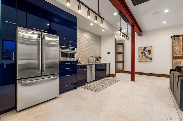 kitchen featuring blue cabinetry, appliances with stainless steel finishes, sink, and beamed ceiling