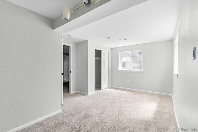 1740 S Ammons St Unit C, Lakewood, CO 80232 - unfurnished bedroom featuring carpet flooring, baseboards, and a closet