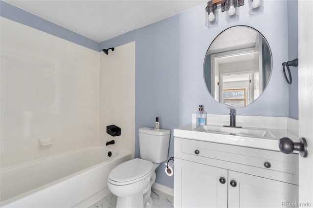1740 S Ammons St Unit C, Lakewood, CO 80232 - full bath featuring toilet, vanity, marble finish flooring,  shower combination, and baseboards