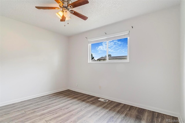 5711 W 92nd Ave Unit 47, Westminster, CO 80031 - empty room with wood finished floors, baseboards, ceiling fan, and a textured ceiling