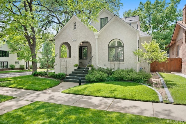 view of front of home with a front yard