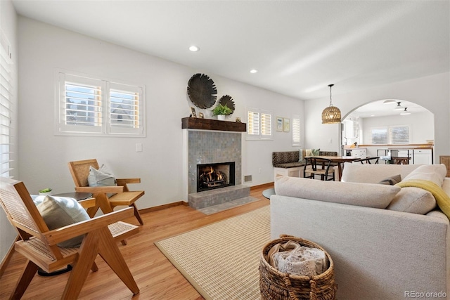 living room with light hardwood / wood-style flooring