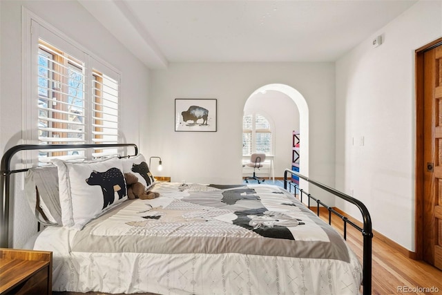 bedroom with light hardwood / wood-style flooring