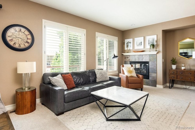 2214 E 101st Ave, Thornton, CO 80229 - living room with a fireplace and light carpet