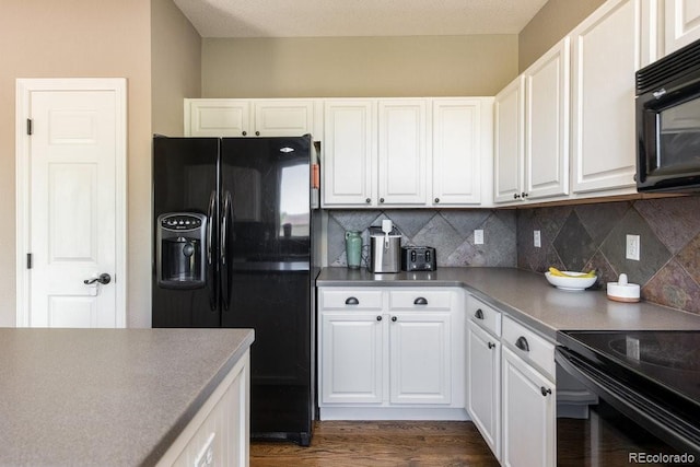 2214 E 101st Ave, Thornton, CO 80229 - kitchen featuring black appliances, tasteful backsplash, and white cabinetry