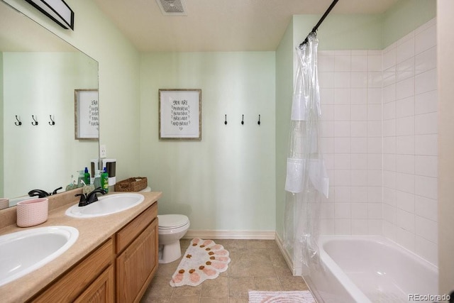 2214 E 101st Ave, Thornton, CO 80229 - full bath with double vanity, shower / bathtub combination with curtain, and tile patterned flooring