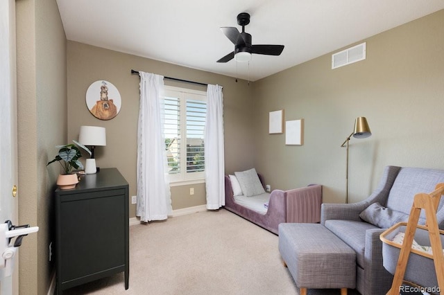 2214 E 101st Ave, Thornton, CO 80229 - living area with light colored carpet and a ceiling fan
