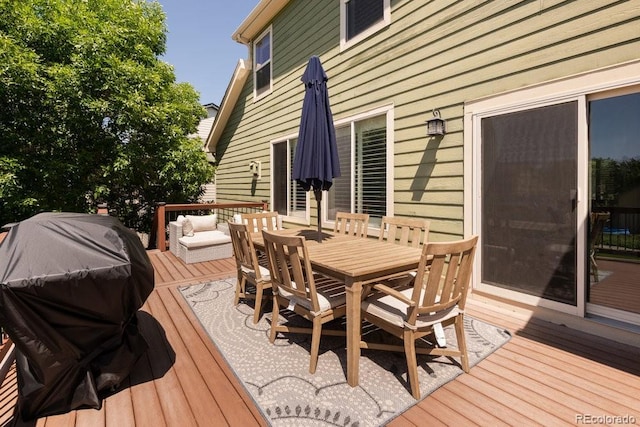 2214 E 101st Ave, Thornton, CO 80229 - wooden terrace featuring outdoor dining area, a grill, and an outdoor living space