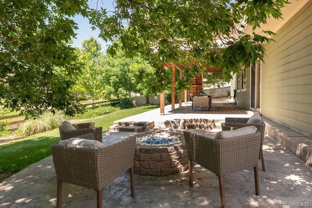2214 E 101st Ave, Thornton, CO 80229 - fenced backyard featuring a fire pit and a patio area