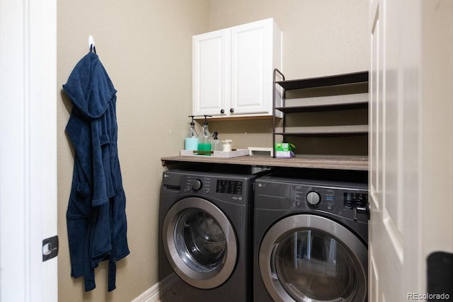 2214 E 101st Ave, Thornton, CO 80229 - washroom featuring washer and clothes dryer and cabinet space