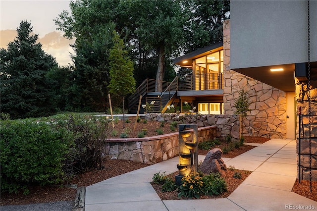 view of patio terrace at dusk