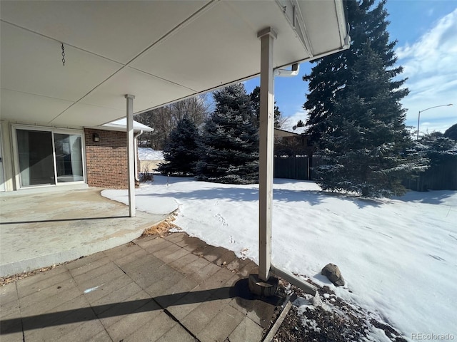 view of snow covered patio