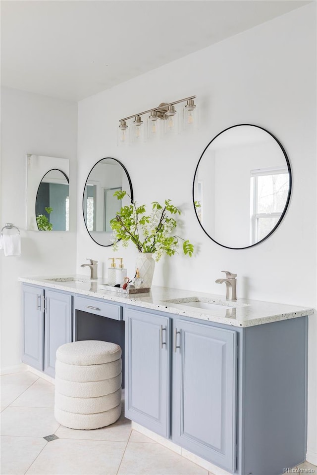 bathroom with vanity and tile patterned floors