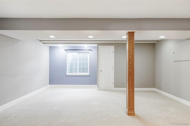 below grade area featuring recessed lighting, carpet floors, and baseboards