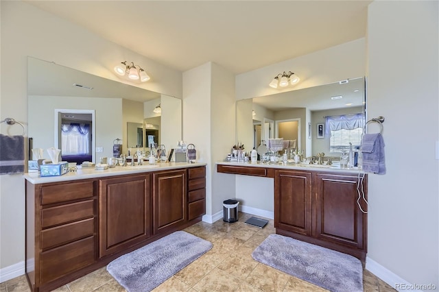 bathroom featuring vanity and tile patterned floors