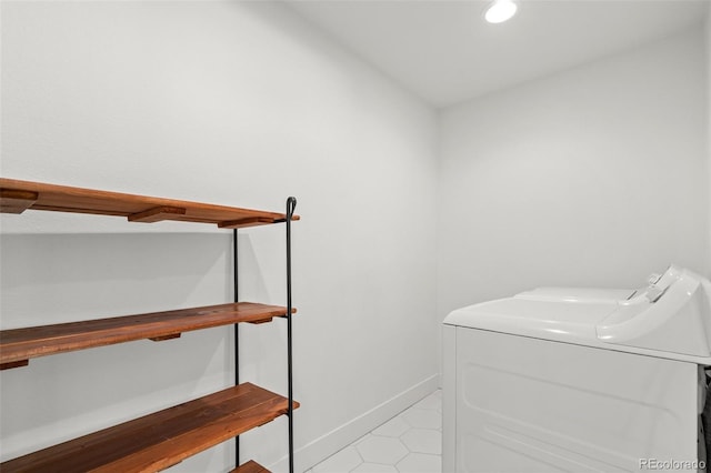 3545 Moorhead Ave, Boulder, CO 80305 - laundry room with independent washer and dryer, recessed lighting, baseboards, and light tile patterned floors