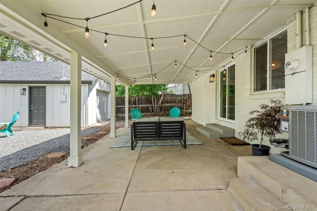 3545 Moorhead Ave, Boulder, CO 80305 - view of patio / terrace with entry steps, cooling unit, an outdoor hangout area, and an outbuilding