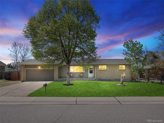 4779 S Owens Way, Littleton, CO 80127 - single story home featuring driveway, a garage, and brick siding