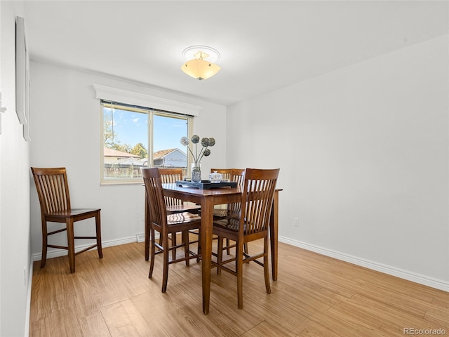 4779 S Owens Way, Littleton, CO 80127 - dining space featuring light wood-type flooring and baseboards