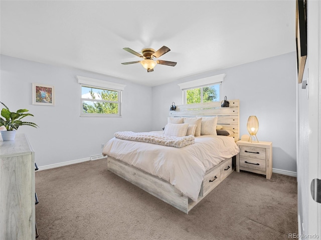 4779 S Owens Way, Littleton, CO 80127 - carpeted bedroom with baseboards and a ceiling fan