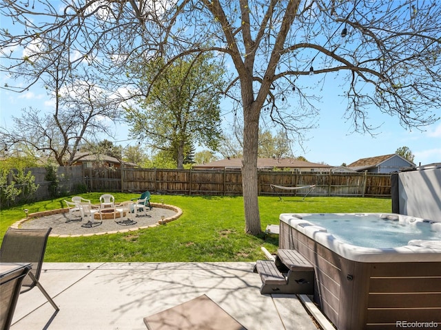 4779 S Owens Way, Littleton, CO 80127 - view of patio with a hot tub and an outdoor fire pit