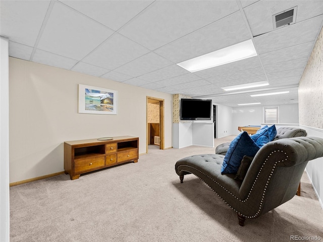 4779 S Owens Way, Littleton, CO 80127 - living area featuring a drop ceiling, carpet floors, and baseboards