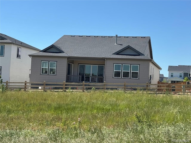 16655 W 93rd Pl, Arvada, CO 80007 - rear view of property featuring roof with shingles