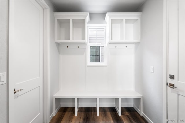 8858 Moonshimmer Trl, Littleton, CO 80125 - mudroom with dark wood-type flooring and baseboards