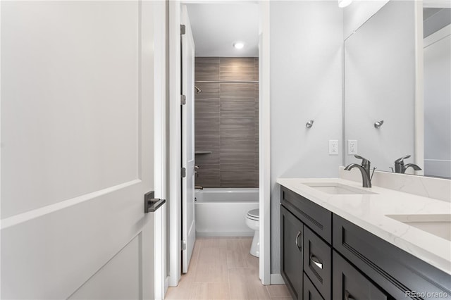 8858 Moonshimmer Trl, Littleton, CO 80125 - full bath featuring double vanity, bathing tub / shower combination, tile patterned floors, and recessed lighting