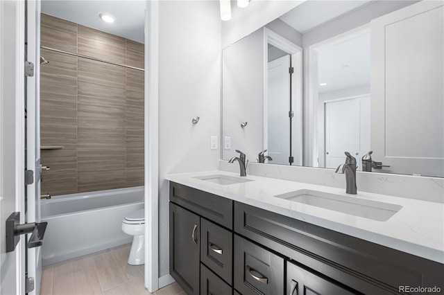 8858 Moonshimmer Trl, Littleton, CO 80125 - bathroom with double vanity, shower / tub combination, and recessed lighting
