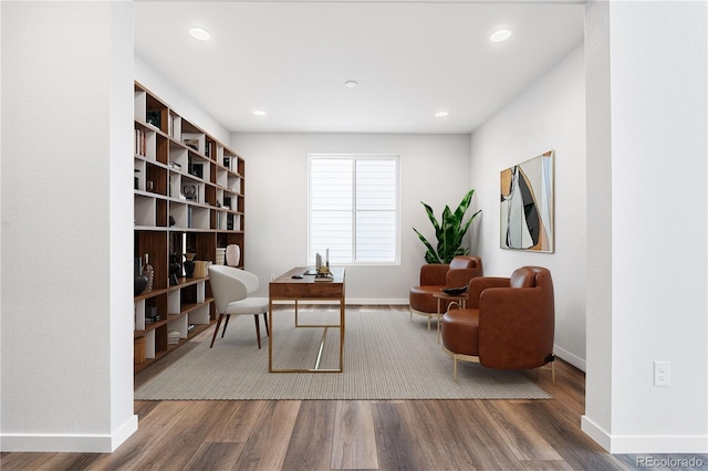 8858 Moonshimmer Trl, Littleton, CO 80125 - sitting room with wood finished floors, recessed lighting, and a desk