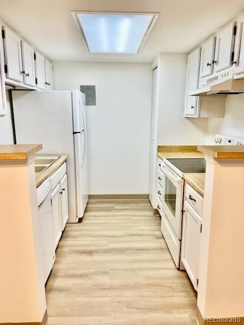 4400 S Quebec St Unit 102R, Denver, CO 80237 - kitchen featuring under cabinet range hood, white appliances, light wood finished floors, light countertops, and white cabinetry