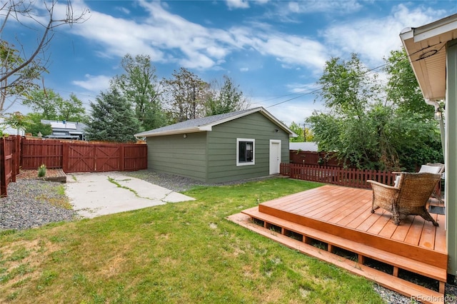 4520 S Delaware St, Englewood, CO 80110 - view of yard featuring a wooden deck, a patio, and an outbuilding