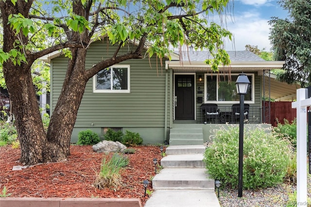 4520 S Delaware St, Englewood, CO 80110 - view of front of property with a porch