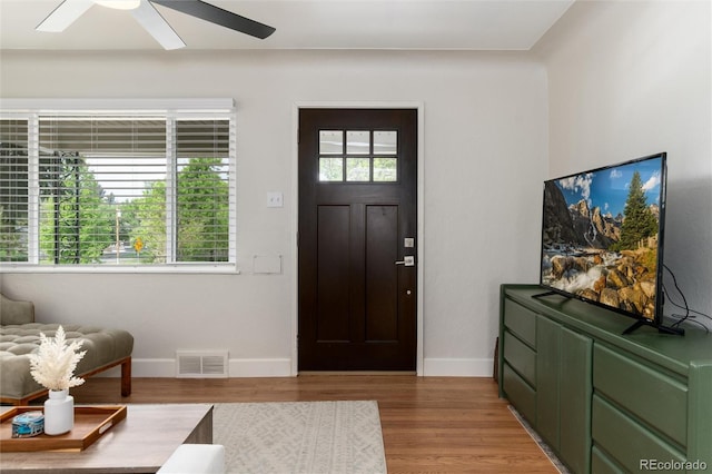 4520 S Delaware St, Englewood, CO 80110 - entryway with ceiling fan, light wood-style flooring, and baseboards