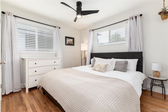 4520 S Delaware St, Englewood, CO 80110 - bedroom with light wood-type flooring and a ceiling fan