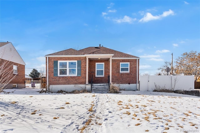 view of snow covered property