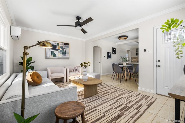 living room featuring light tile patterned floors, crown molding, and a wall unit AC