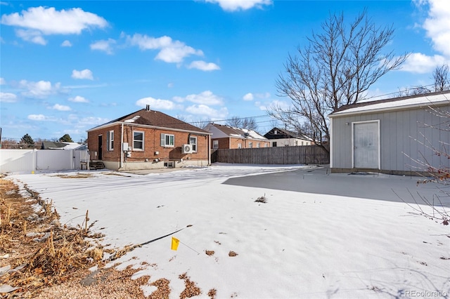 view of snow covered property